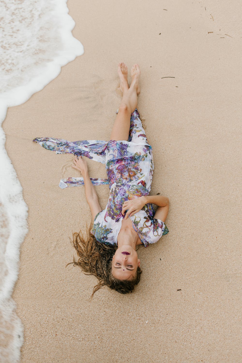 woman lying on beach